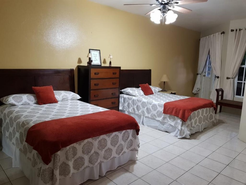 MLS#AE ANDERSON ESTATE. 2 BEDROOM, 1BATHROOM. FULLY-FURNISHED APARTMENT - Cayman  Property