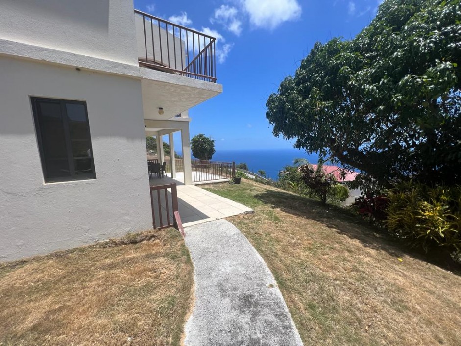 MLS#2023FH03 FAHIE HILL 2 BEDROOMS, 2 BATHROOMS FULLY FURNISHED APARTMENT -  Properties Listing